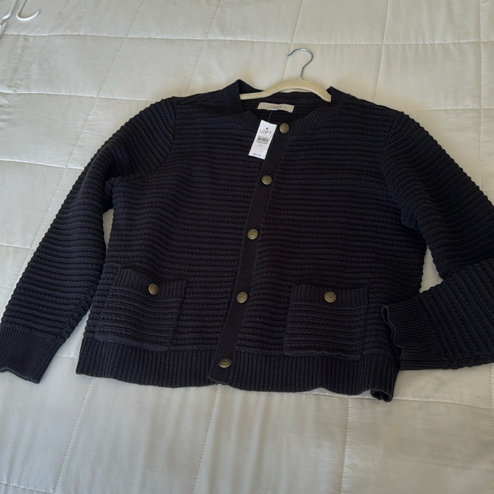 NWT. Black lady jacket/ cardigan. Size XL.